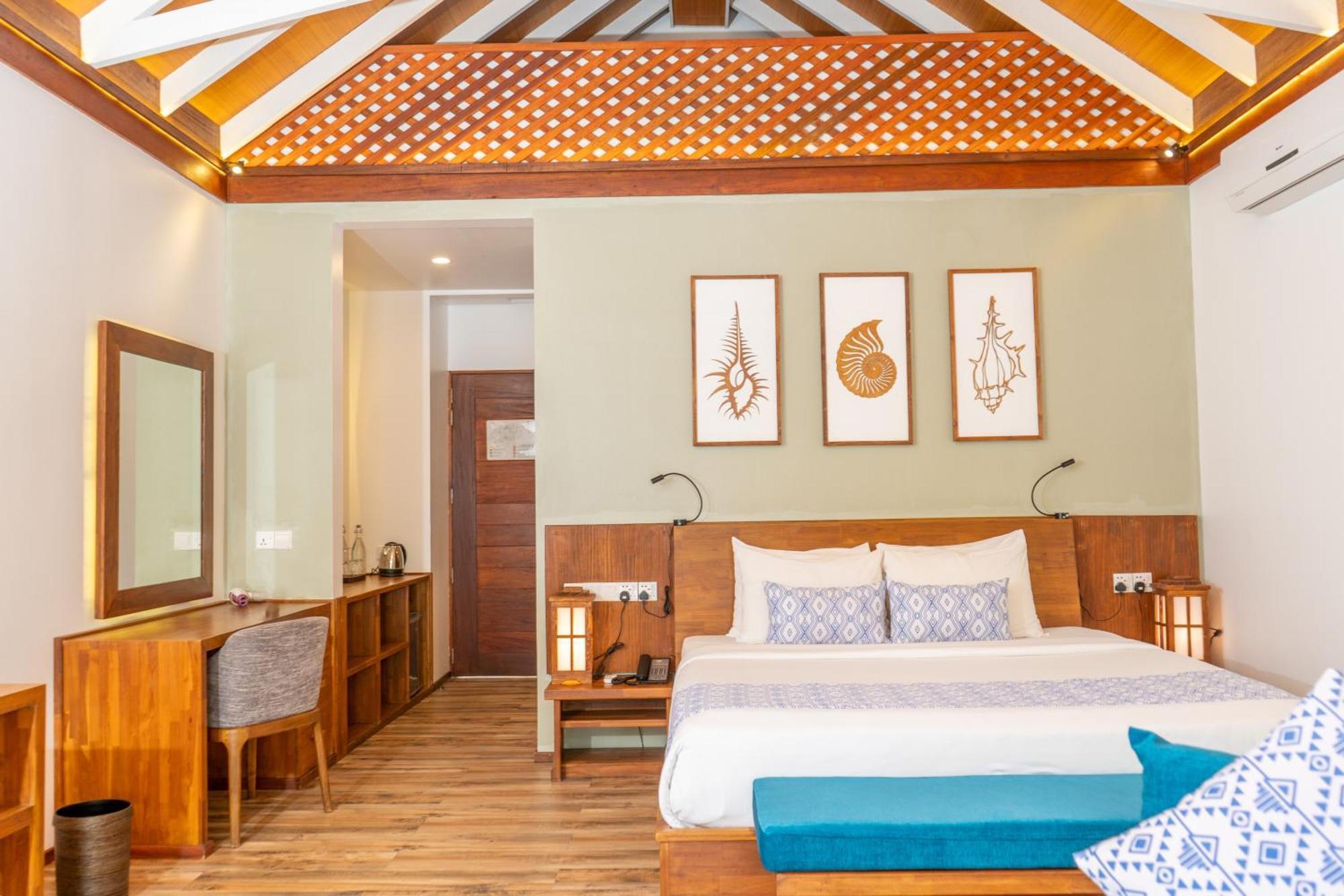 Kudafushi Resort & Spa Меедхоо Экстерьер фото